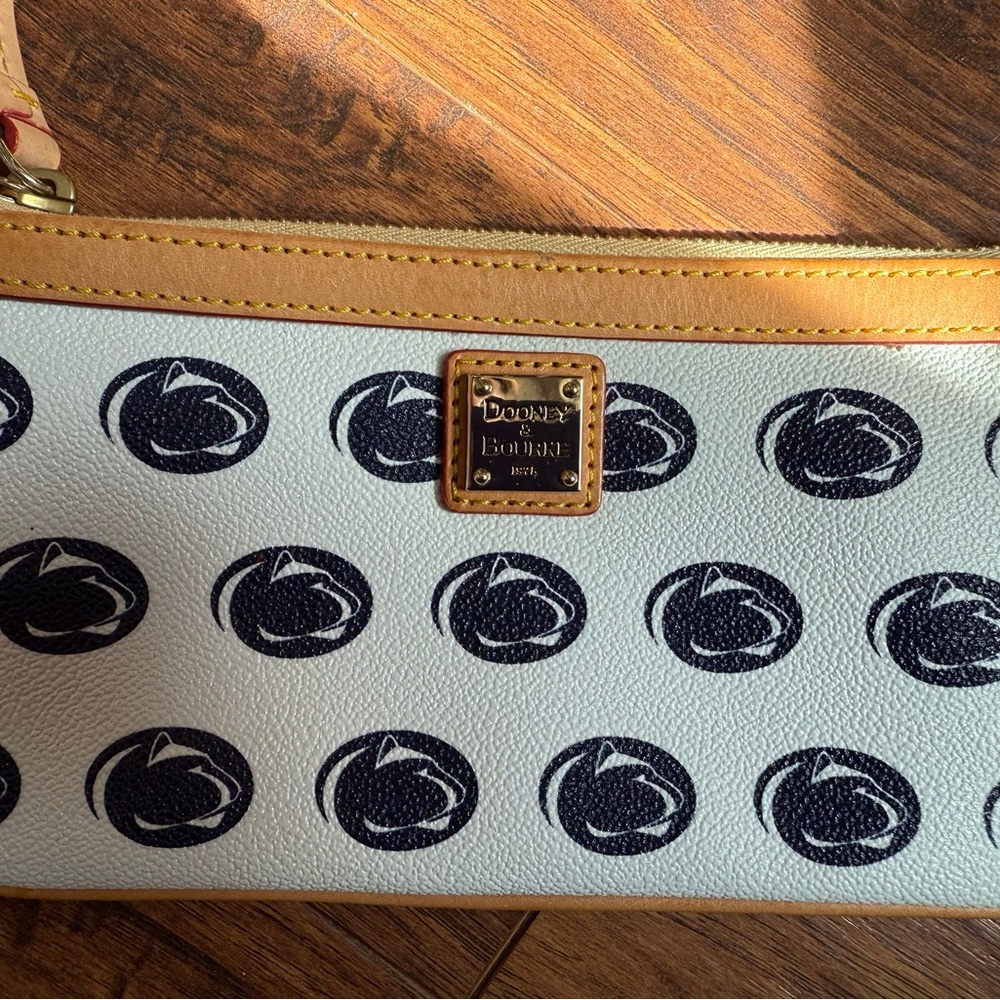 Dooney & Bourke White and Tan Penn State Logo Wristlet